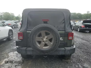 2007 Jeep Wrangler Unlimited Sahara с VIN 1J4GA59107L141710, выставлен на аукционе Copart как лот 59939755 с пробегом 212 659 миль миль и Списание • Salvage title. История ставок и продаж доступна на DreamBid. Изображение 6.