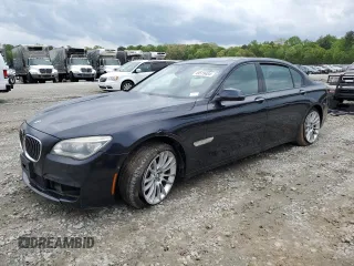 2015 BMW 7 Series 750Li with VIN WBAYE8C50FD781398, listed as a Copart auction lot 49519484 with 54,075 mi miles and Salvage Title. Bid and sale history available at carsss.com. Image 1.