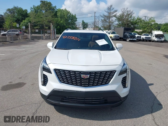 2020 Cadillac XT4 FWD Sport with VIN 1GYFZER4XLF116224, listed as a IAAI auction lot 42759271 with 31,395 mi miles and . Bid and sale history available at DreamBid. Image 6.
