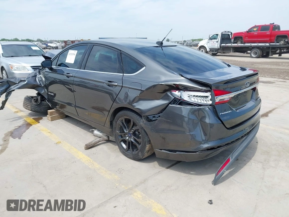 2018 Ford Fusion Hybrid SE with VIN 3FA6P0LU1JR116139, listed as a IAAI auction lot 41933594 with 83,000 mi miles. Bid and sale history available at carsss.com. Image 3.