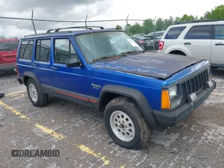 1995 Jeep Cherokee Sport z VIN 1J4FJ68S6SL658465, wystawiony jako IAAI lot #42171787 z przebiegiem 197 677 mil mil oraz . Historia ofert i sprzedaży dostępna na DreamBid. Obrazek 1.