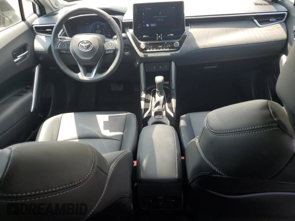 2023 Toyota Corolla Cross XLE with VIN 7MUDAABGXPV060797, listed as a Copart auction lot 62110665 with 18,293 mi miles and Salvage title. Bid and sale history available at DreamBid. Image 8.