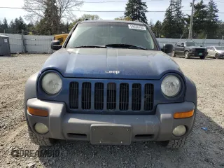 2003 Jeep Liberty Sport with VIN 1J4GL48K83W692264, listed as a Copart auction lot 54525105 with 176,056 mi miles and Salvage Title. Bid and sale history available at carsss.com. Image 5.