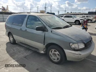 1999 Toyota Sienna LE with VIN 4T3ZF13C6XU128055, listed as a Copart auction lot 81100934 with 0 mi miles and Salvage Title. Bid and sale history available at carsss.com. Image 4.