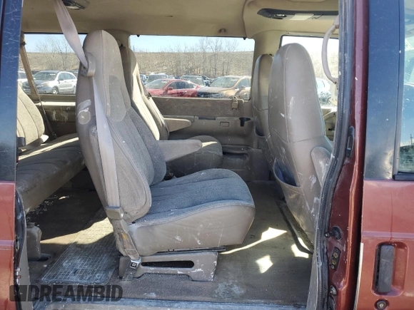 1999 GMC Safari z VIN 1GKEL19W2XB506085, wystawiony jako Copart lot #45527785 z przebiegiem 213 594 mil mil oraz Szkoda całkowita • Salvage title. Historia ofert i sprzedaży dostępna na DreamBid. Obrazek 11.