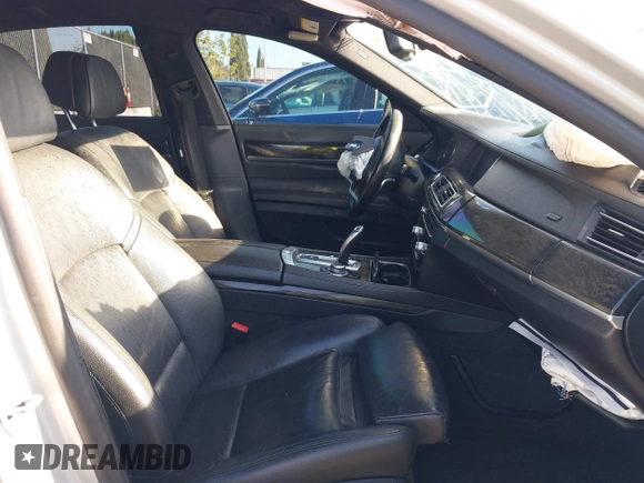 2013 BMW 7 Series 740i with VIN WBAYA6C51DD143836, listed as a IAAI auction lot 39215782 with 176,881 mi miles and . Bid and sale history available at DreamBid. Image 5.