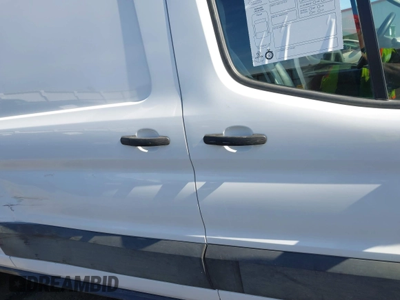 2023 Ford Transit Cargo with VIN 1FTBR2X84PKB37947, listed as a IAAI auction lot 41750849 with 58,114 mi miles and . Bid and sale history available at DreamBid. Image 13.