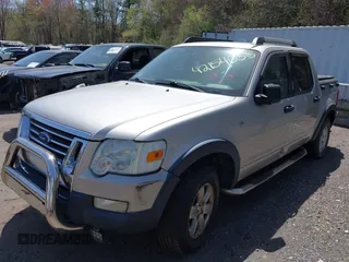 2007 Ford Explorer Sport Trac XLT z VIN 1FMEU51807UB19953, wystawiony jako IAAI lot #42154055 z przebiegiem 199 105 mil mil oraz . Historia ofert i sprzedaży dostępna na DreamBid. Obrazek 2.