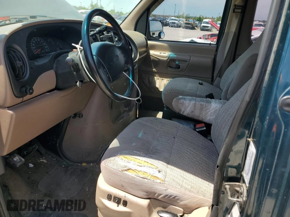 1998 Ford Econoline Passenger XL with VIN 1FMRE11L0WHA00514, listed as a Copart auction lot 64441065 with 111,243 mi miles and Salvage title. Bid and sale history available at DreamBid. Image 7.