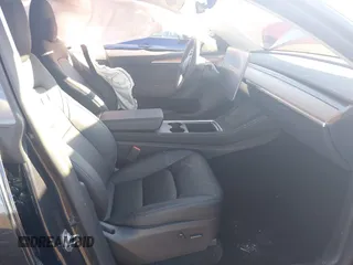 2024 Tesla Model Y Long Range with VIN 7SAYGAEEXRF212415, listed as a IAAI auction lot 41665627 with Not Provided miles and . Bid and sale history available at DreamBid. Image 5.
