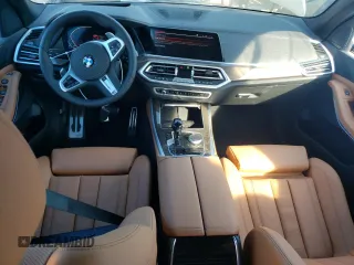 2022 BMW X5 xDrive40i with VIN 5UXCR6C05N9M87988, listed as a Copart auction lot 70896652 with 571 mi miles. Bid and sale history available at carsss.com. Image 8.