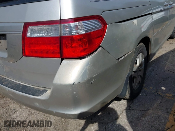 2006 Honda Odyssey EX z VIN 5FNRL38456B400315, wystawiony jako IAAI lot #41803520 z przebiegiem 191 851 mil mil oraz . Historia ofert i sprzedaży dostępna na DreamBid. Obrazek 6.