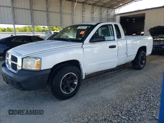 2006 Dodge Dakota ST z VIN 1D7HE22K46S516928, wystawiony jako Copart lot #58662285 z przebiegiem 306 970 mil mil oraz Czysty tytuł • Clean title. Historia ofert i sprzedaży dostępna na DreamBid. Obrazek 1.