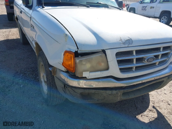 2002 Ford Ranger XL with VIN 1FTYR10D12PB49674, listed as a IAAI auction lot 41732558 with 208,449 mi miles. Bid and sale history available at carsss.com. Image 12.