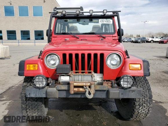 2003 Jeep Wrangler Rubicon z VIN 1J4FA69S43P321494, wystawiony jako Copart lot #43614905 z przebiegiem 99 001 mil mil oraz Czysty tytuł • Clean title. Historia ofert i sprzedaży dostępna na DreamBid. Obrazek 5.
