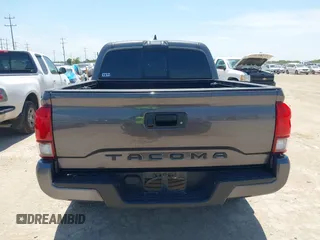 2021 Toyota Tacoma SR with VIN 3TYAX5GN3MT015565, listed as a IAAI auction lot 42241436 with 46,921 mi miles and . Bid and sale history available at DreamBid. Image 16.