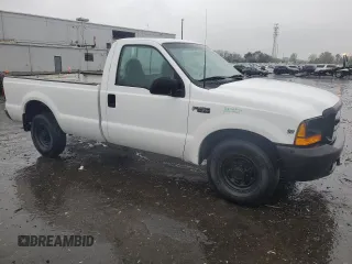 1999 Ford Super Duty F-250 XL with VIN 1FTNF20L0XEA51389, listed as a Copart auction lot 52618635 with 198,767 mi miles and Salvage Title. Bid and sale history available at carsss.com. Image 4.