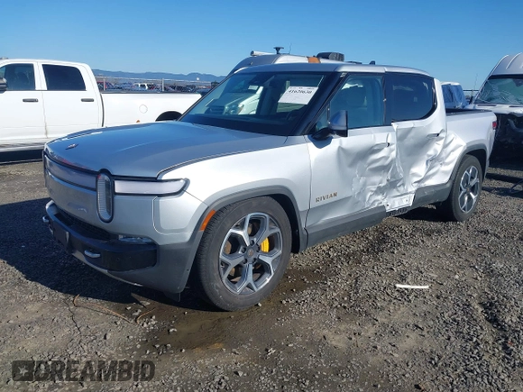 2023 Rivian R1T Adventure with VIN 7FCTGAAA0PN021864, listed as a IAAI auction lot 41620630 with 1 mi miles. Bid and sale history available at carsss.com. Image 19.