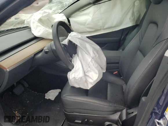 2023 Tesla Model 3 с VIN 5YJ3E1EA3PF426945, выставлен на аукционе Copart как лот 62584185 с пробегом Не указан миль и Списание • Salvage title. История ставок и продаж доступна на DreamBid. Изображение 7.
