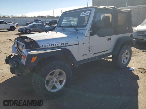 2003 Jeep Wrangler Rubicon z VIN 1J4FA69SX3P301962, wystawiony jako Copart lot #79928744 z przebiegiem Nie podano mil oraz Czysty tytuł • Clean title. Historia ofert i sprzedaży dostępna na DreamBid. Obrazek 1.