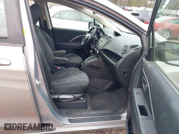 2013 Mazda 5 Sport with VIN JM1CW2BL5D0147824, listed as a IAAI auction lot 41822647 with 160,153 mi miles and . Bid and sale history available at carsss.com. Image 5.