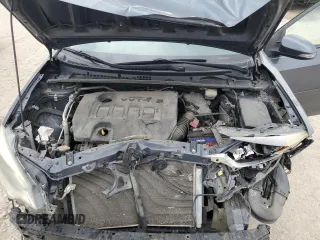 2016 Toyota Corolla L z VIN 5YFBURHE1GP547232, wystawiony jako Copart lot #56063015 z przebiegiem 166 676 mil mil oraz Szkoda całkowita • Salvage title. Historia ofert i sprzedaży dostępna na DreamBid. Obrazek 11.