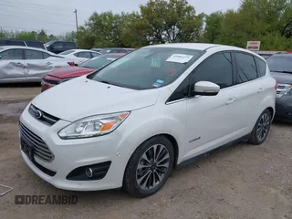 2018 Ford C-Max Titanium with VIN 1FADP5DUXJL104279, listed as a IAAI auction lot 41882275 with 55,137 mi miles and . Bid and sale history available at DreamBid. Image 2.