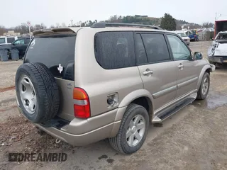 2003 Suzuki XL-7 Touring with VIN JS3TX92V334115616, listed as a IAAI auction lot 40899791 with 154,521 mi miles. Bid and sale history available at carsss.com. Image 4.