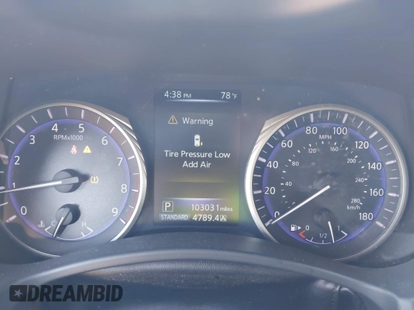 2015 Infiniti Q50 Premium with VIN JN1BV7AP2FM336977, listed as a IAAI auction lot 41782699 with 103,031 mi miles. Bid and sale history available at carsss.com. Image 7.