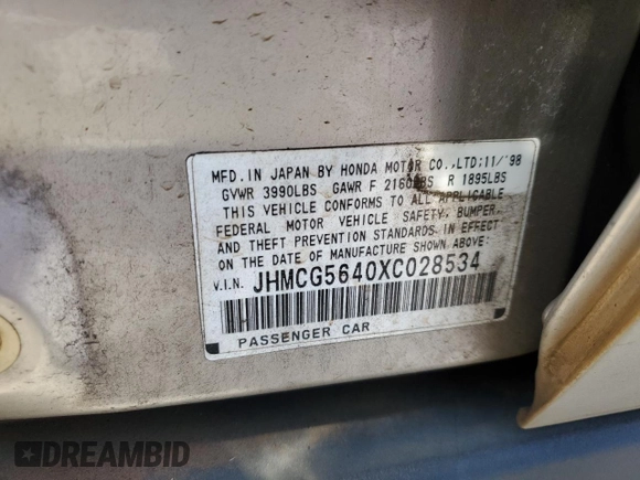 1999 Honda Accord LX with VIN JHMCG5640XC028534, listed as a Copart auction lot 61695935 with 227,032 mi miles and Clean title. Bid and sale history available at DreamBid. Image 12.