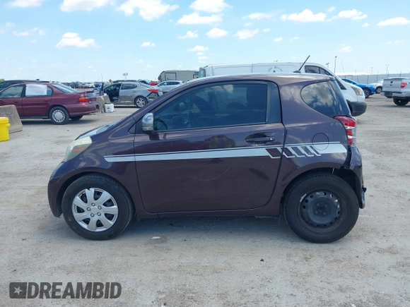 2012 Scion iQ with VIN JTNJJXB0XCJ021245, listed as a IAAI auction lot 42463167 with 158,901 mi miles and . Bid and sale history available at DreamBid. Image 14.