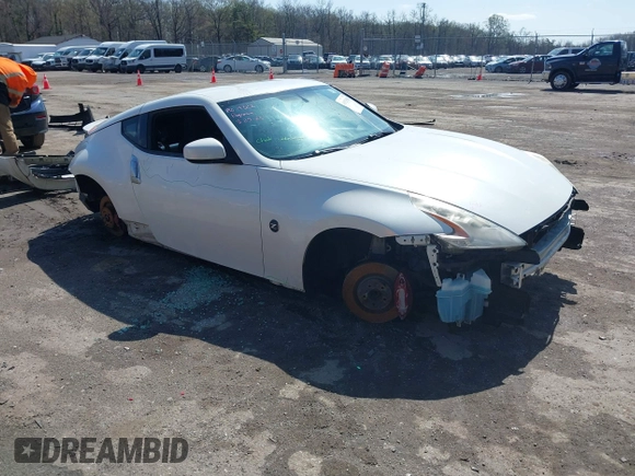 2014 Nissan 370Z with VIN JN1AZ4EH8EM634403, listed as a IAAI auction lot 41923568 with 137,676 mi miles. Bid and sale history available at carsss.com. Image 1.