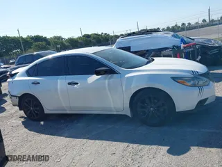 2018 Nissan Altima 2.5 SV with VIN 1N4AL3AP4JC264501, listed as a IAAI auction lot 41795559 with 43,764 mi miles. Bid and sale history available at carsss.com. Image 14.