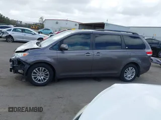 2014 Toyota Sienna XLE with VIN 5TDYK3DC7ES517206, listed as a IAAI auction lot 41945572 with 128,743 mi miles and . Bid and sale history available at DreamBid. Image 15.