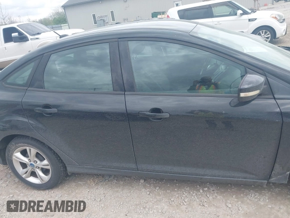 2013 Ford Focus SE with VIN 1FADP3F25DL209199, listed as a IAAI auction lot 42086573 with 136,999 mi miles. Bid and sale history available at carsss.com. Image 14.