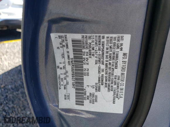1999 Ford Taurus SE Standard with VIN 1FAFP58U9XG271897, listed as a Copart auction lot 73048784 with 190,518 mi miles and Salvage title. Bid and sale history available at DreamBid. Image 12.