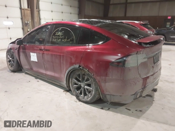 2023 Tesla Model X with VIN 7SAXCDE51PF403632, listed as a IAAI auction lot 41328722 with Not Provided miles and . Bid and sale history available at DreamBid. Image 3.