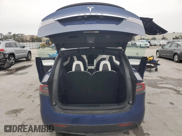 2020 Tesla Model X Long Range with VIN 5YJXCBE2XLF250234, listed as a Copart auction lot 42236365 with 63,401 mi miles and Non Repairable. Bid and sale history available at carsss.com. Image 6.