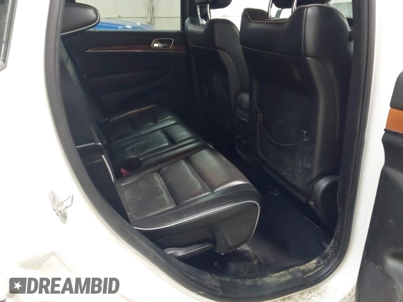2013 Jeep Grand Cherokee Overland with VIN 1C4RJFCT1DC586886, listed as a IAAI auction lot 41941590 with 125,126 mi miles. Bid and sale history available at carsss.com. Image 8.