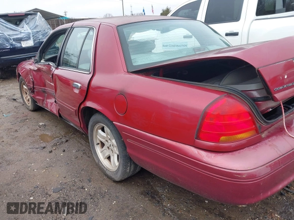 2002 Ford Crown Victoria LX z VIN 2FAFP74W82X148324, wystawiony jako IAAI lot #41565717 z przebiegiem 114 536 mil mil oraz . Historia ofert i sprzedaży dostępna na DreamBid. Obrazek 3.