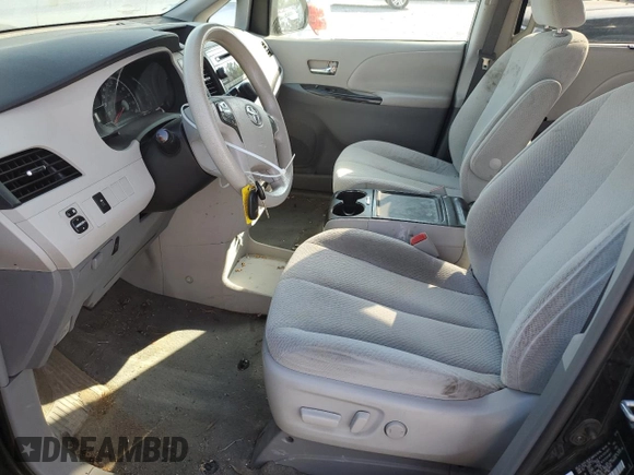 2014 Toyota Sienna LE AAS with VIN 5TDKK3DC6ES490361, listed as a Copart auction lot 54257635 with 164,380 mi miles and Salvage Title. Bid and sale history available at DreamBid. Image 7.