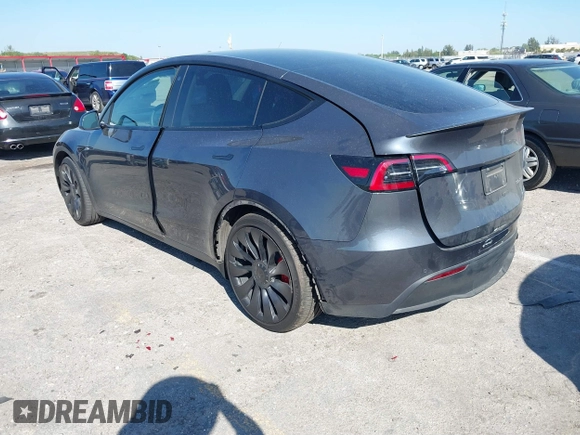 2022 Tesla Model Y Performance with VIN 7SAYGDEF6NF540094, listed as a IAAI auction lot 41786865 with 28,356 mi miles and . Bid and sale history available at DreamBid. Image 3.