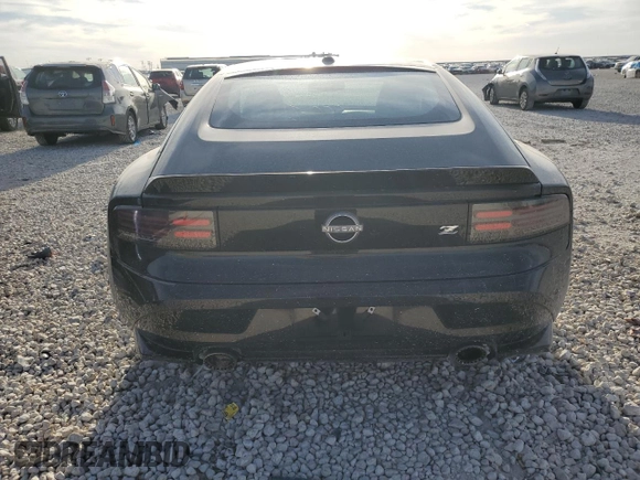 2024 Nissan Z Performance с VIN JN1BZ4BH3RM366584, выставлен на аукционе Copart как лот 49207535 с пробегом 4 936 миль миль и Списание • Salvage title. История ставок и продаж доступна на DreamBid. Изображение 6.