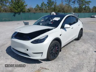 2023 Tesla Model Y Long Range with VIN 7SAYGAEE1PF665934, listed as a IAAI auction lot 41780949 with 21,949 mi miles and . Bid and sale history available at DreamBid. Image 16.
