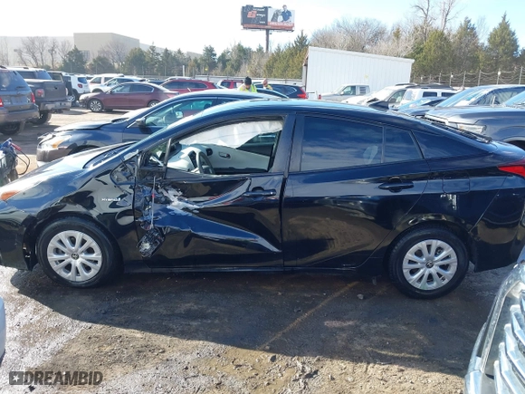 2020 Toyota Prius L Eco with VIN JTDKARFU7L3119834, listed as a IAAI auction lot 41653177 with 140,964 mi miles. Bid and sale history available at carsss.com. Image 14.