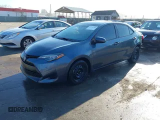 2018 Toyota Corolla L z VIN 2T1BURHE5JC969463, wystawiony jako IAAI lot #41760784 z przebiegiem 406 432 mil mil oraz . Historia ofert i sprzedaży dostępna na DreamBid. Obrazek 2.