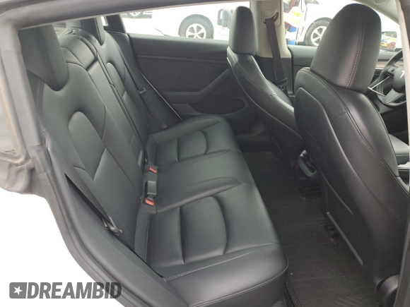 2023 Tesla Model 3 с VIN 5YJ3E1EA3PF557941, выставлен на аукционе Copart как лот 53047505 с пробегом 53 060 миль миль и Списание • Salvage title. История ставок и продаж доступна на DreamBid. Изображение 10.