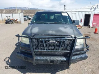 2004 Ford F-150 XLT with VIN 1FTPX14554NC14612, listed as a IAAI auction lot 41890306 with 208,248 mi miles. Bid and sale history available at carsss.com. Image 12.