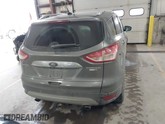 2014 Ford Escape Titanium with VIN 1FMCU9J90EUC31625, listed as a IAAI auction lot 41492075 with 301,917 mi miles and . Bid and sale history available at DreamBid. Image 16.