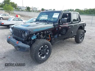 2024 Jeep Wrangler Rubicon X z VIN 1C4RJXR64RW197186, wystawiony jako IAAI lot #42405700 z przebiegiem 6 397 mil mil oraz . Historia ofert i sprzedaży dostępna na DreamBid. Obrazek 21.